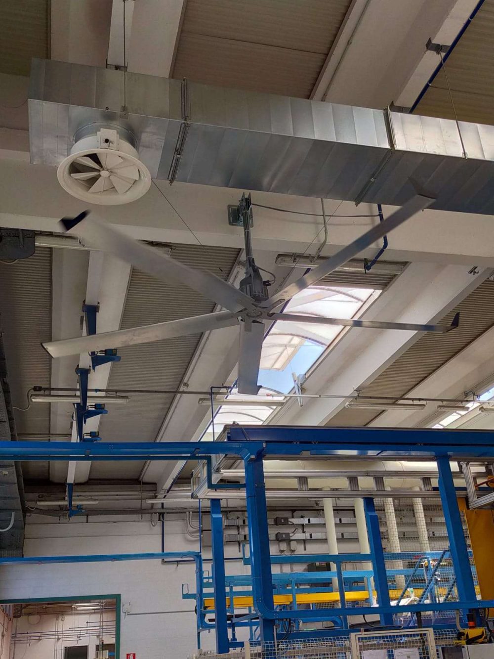 Industrial HVLS fan installation in manufacturing plant